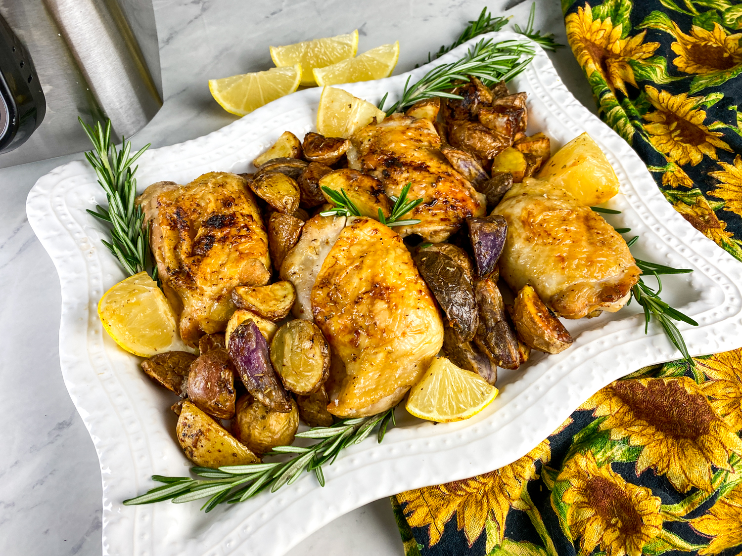 a tray of chicken lemon thighs