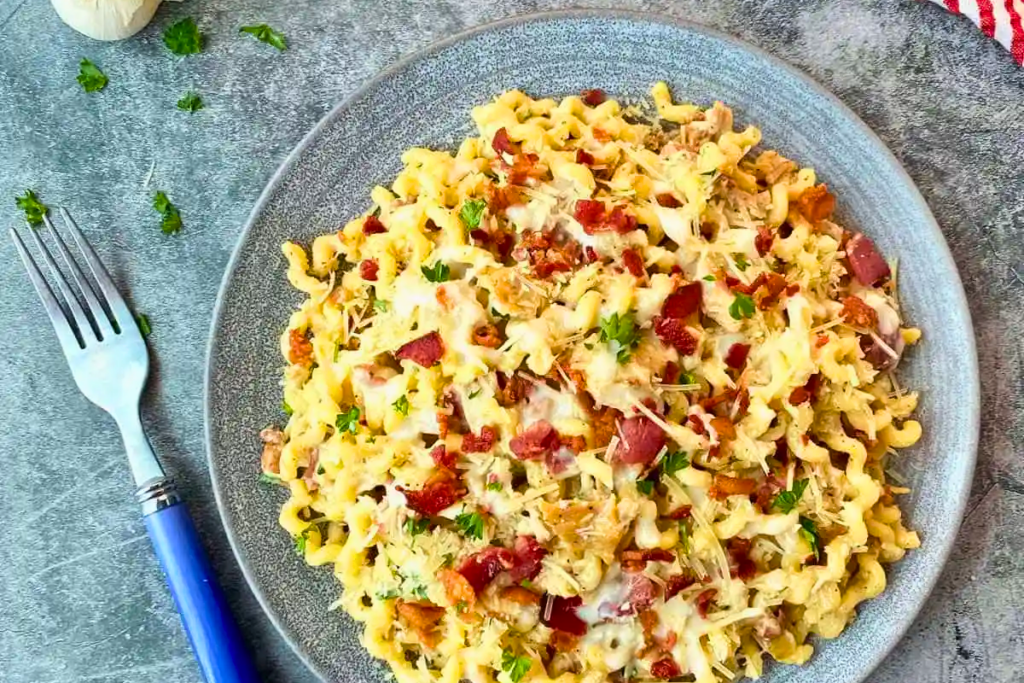 A serving of Chicken Parmesan Garlic Pasta with Bacon 