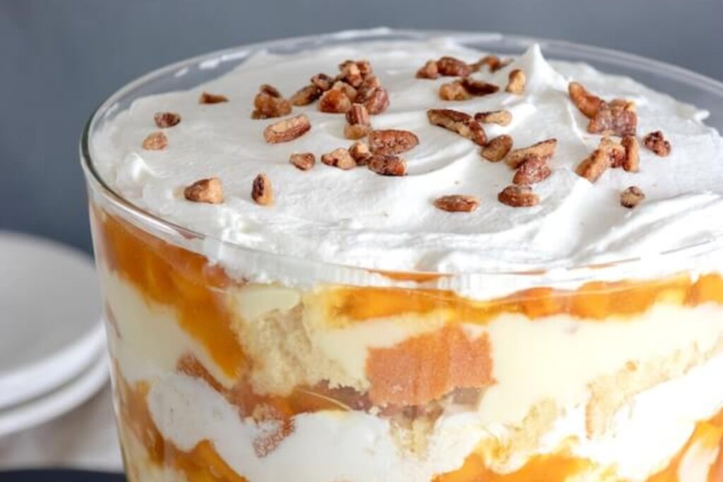 A glass of Easy Peach Trifle Recipe
