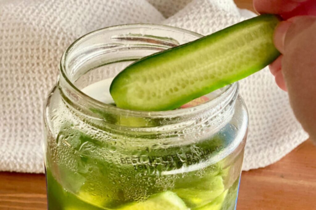 Homemade Pickles dipping in Leftover Pickle Juice