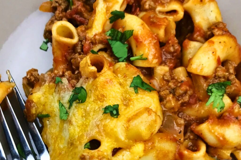 Homemade Beefaroni Casserole With Cheese in a plate