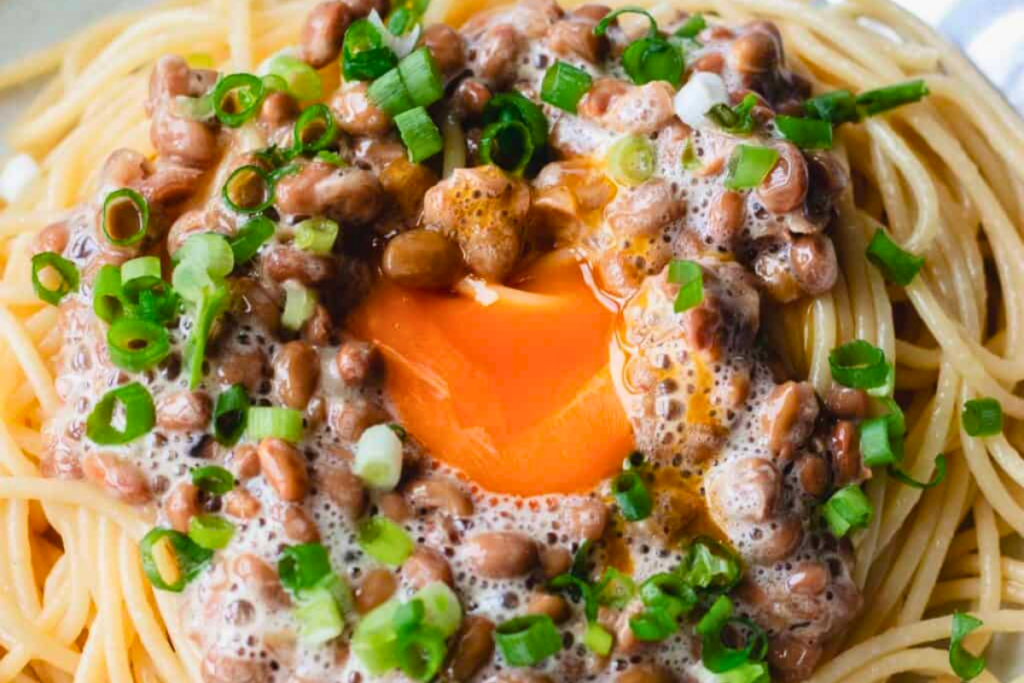 A plate of Natto Pasta with Raw Egg 