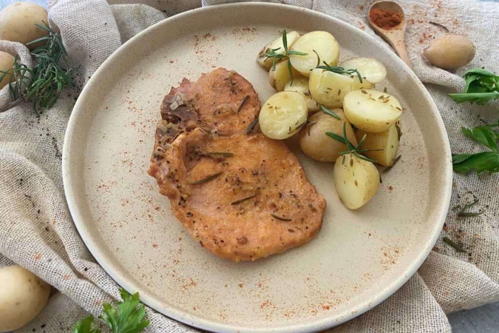 A plate of Pork Chops and Potatoes