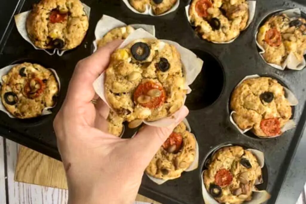 Holding a Savoury Pizza Muffins 