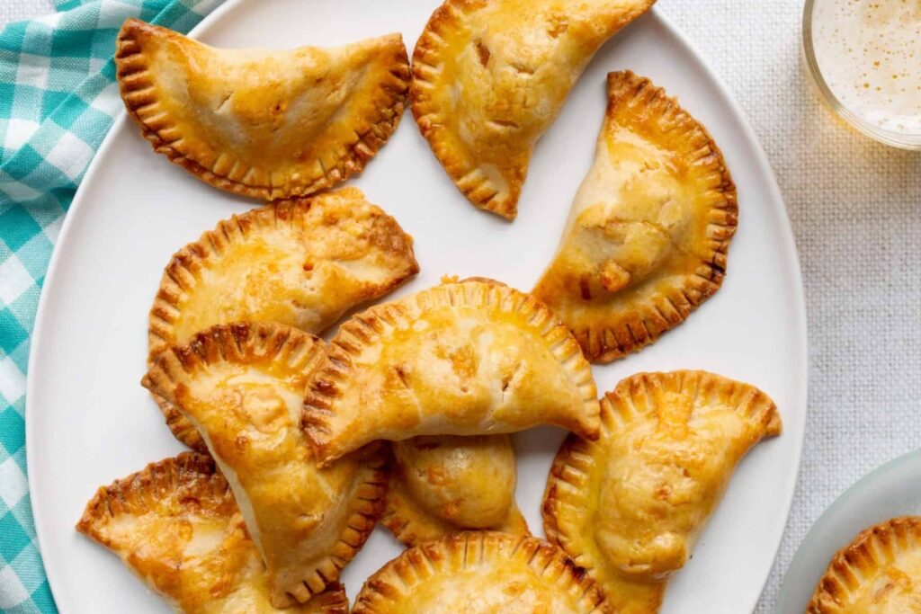 Short-Cut Sautéed Onion, Ham, And Cheese Empanadas