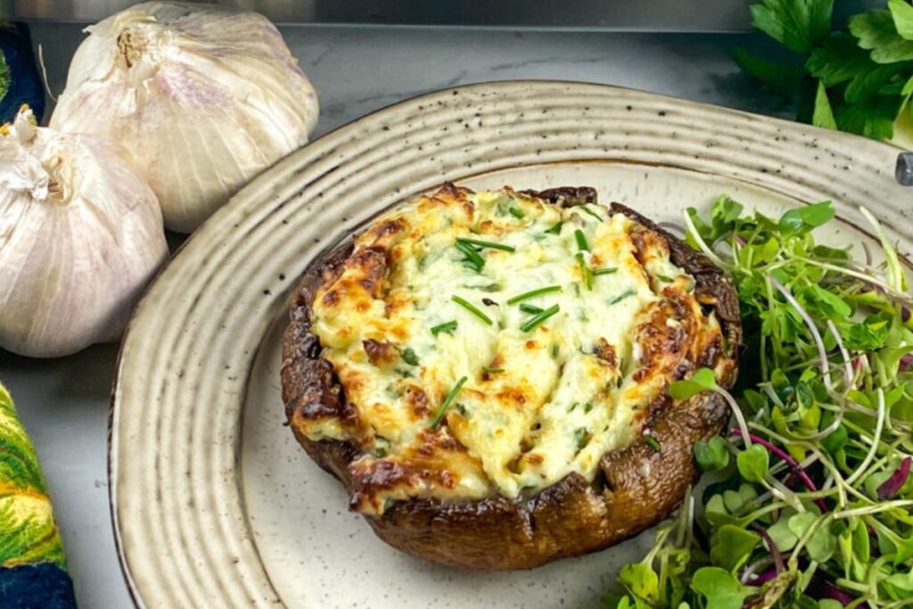 Stuffed Portobello Mushrooms + Bonus Recipe (Air Fryer Roasted Garlic) on a plate