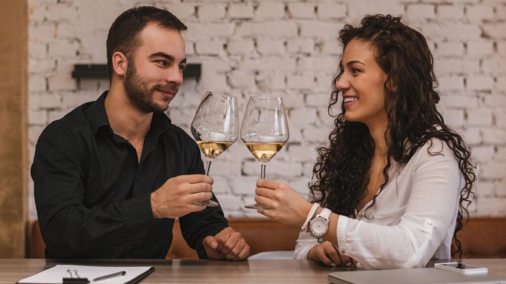 couple with wine at table