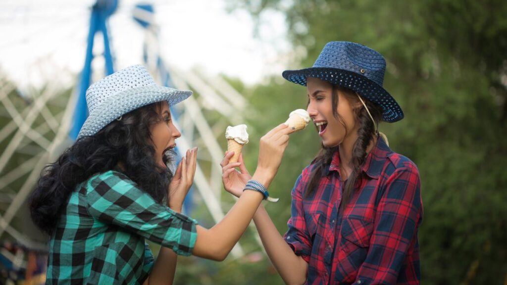 cowgirls laughing with ice cream