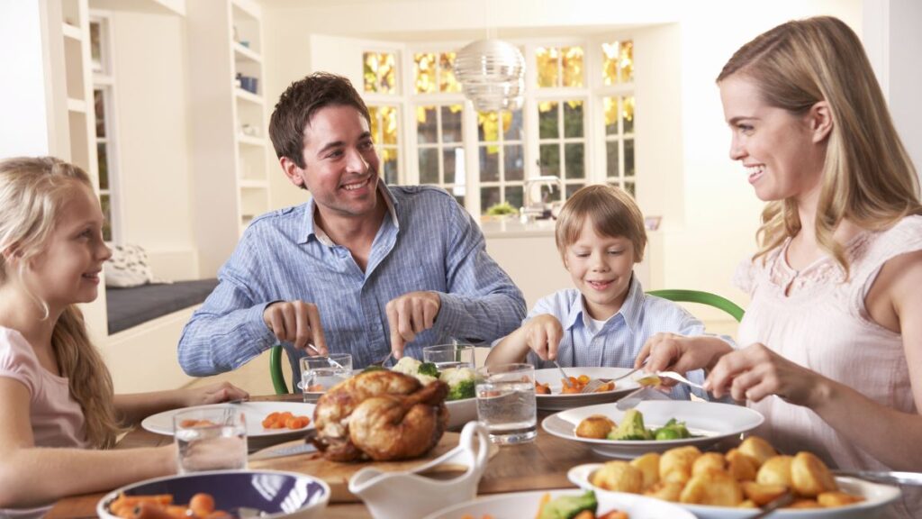 family sitting at dinner table