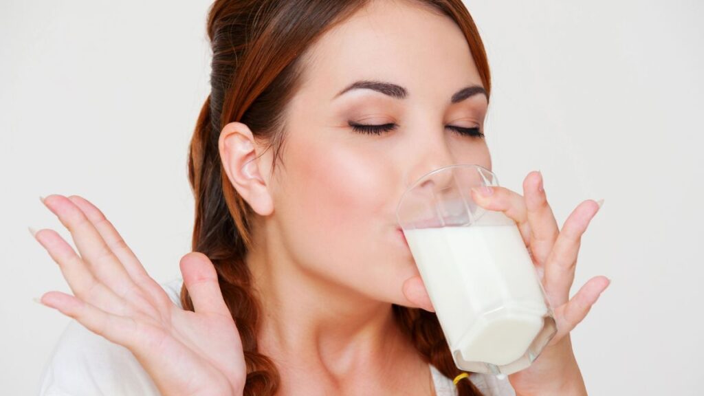 happy woman drinking milk