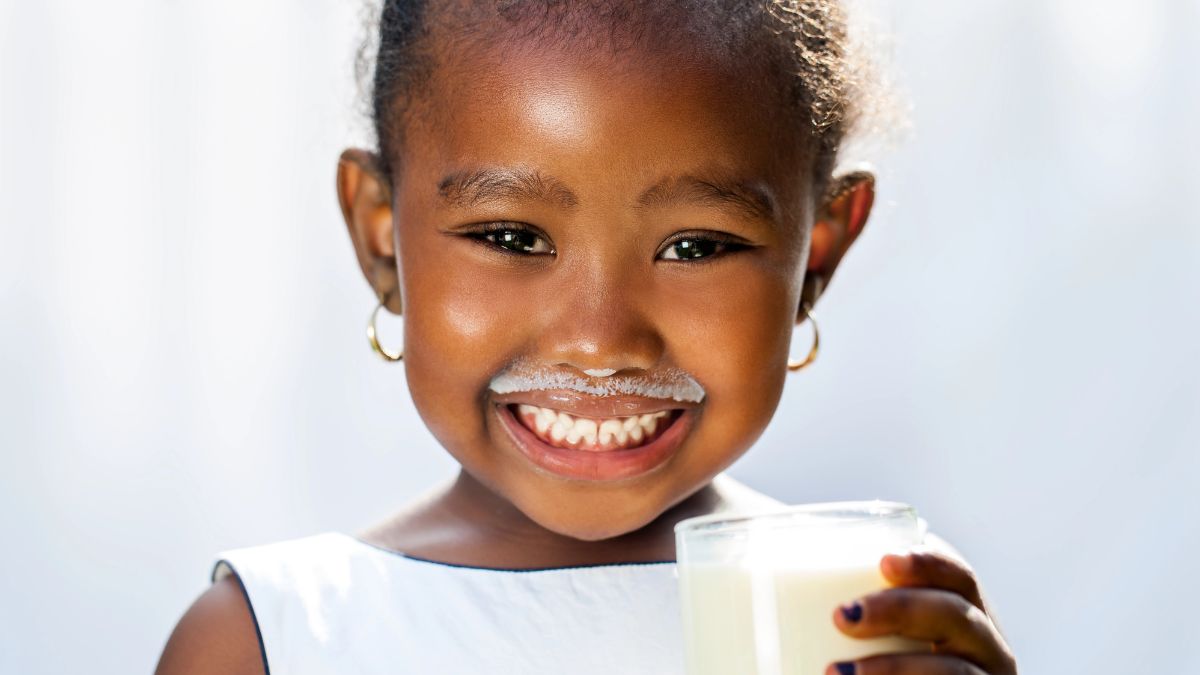 little girl with milk mustache