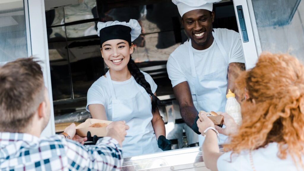 people buying food at food cart