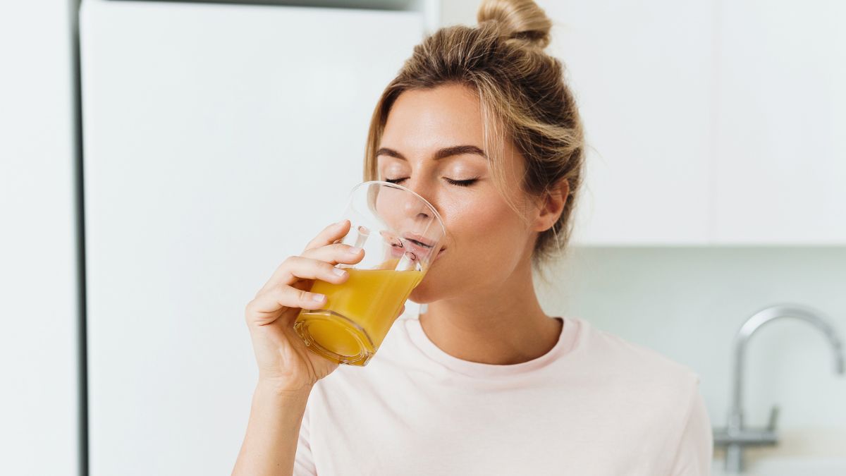 woman drinking juice