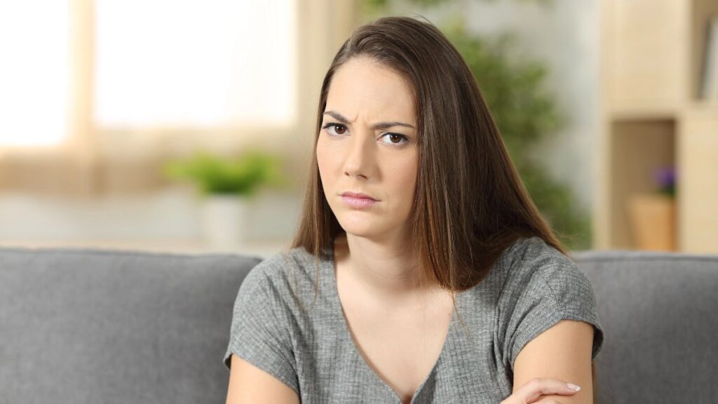 woman looking upset and confused