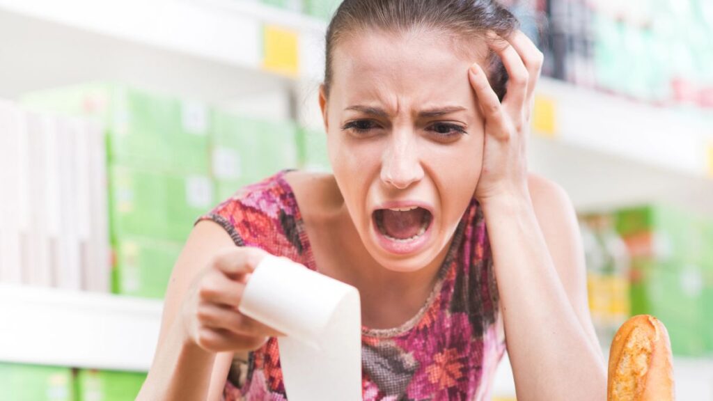 woman upset about grocery bill