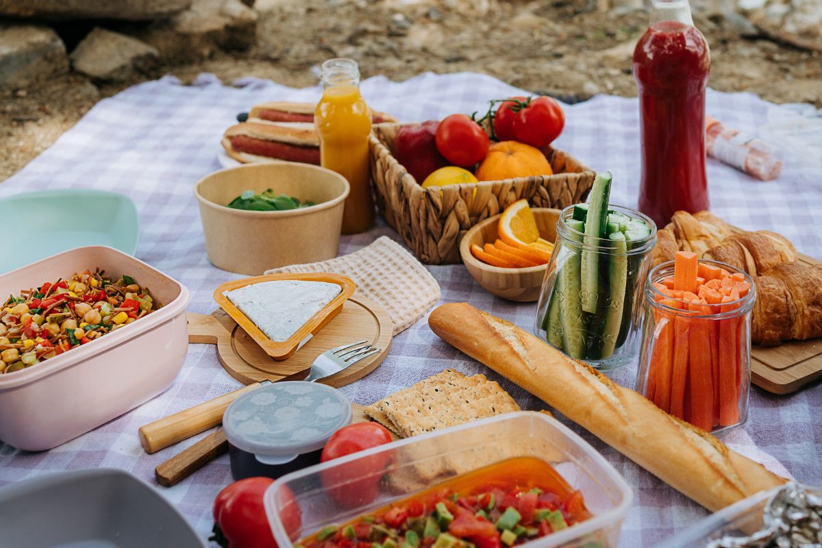 Picnic foods laid out on a blanket