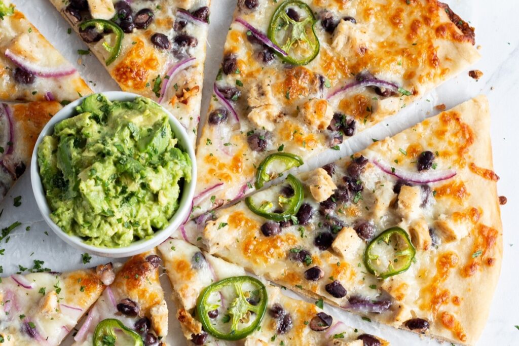 chicken pizza with black beans And smashed avocado