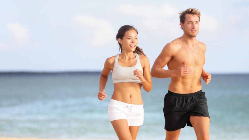 couple running on beach