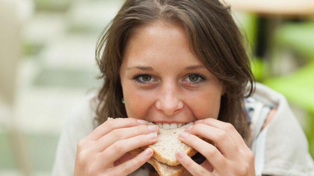 girl eating sandwich