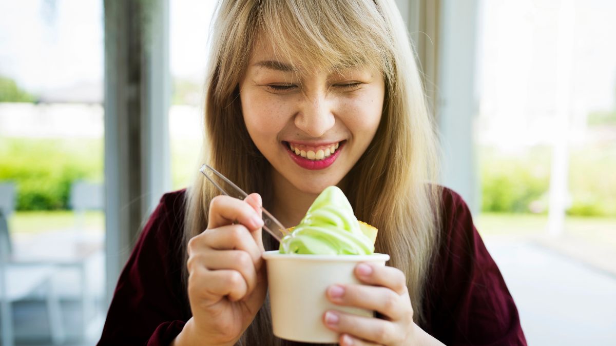 happy woman eating ice cream