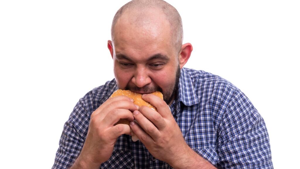 man eating sandwich