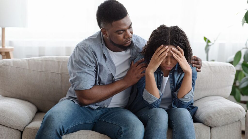 man showing empathy to crying woman