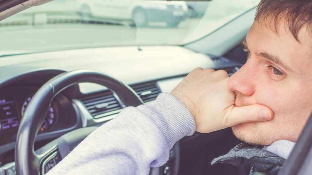 man upset in driver seat