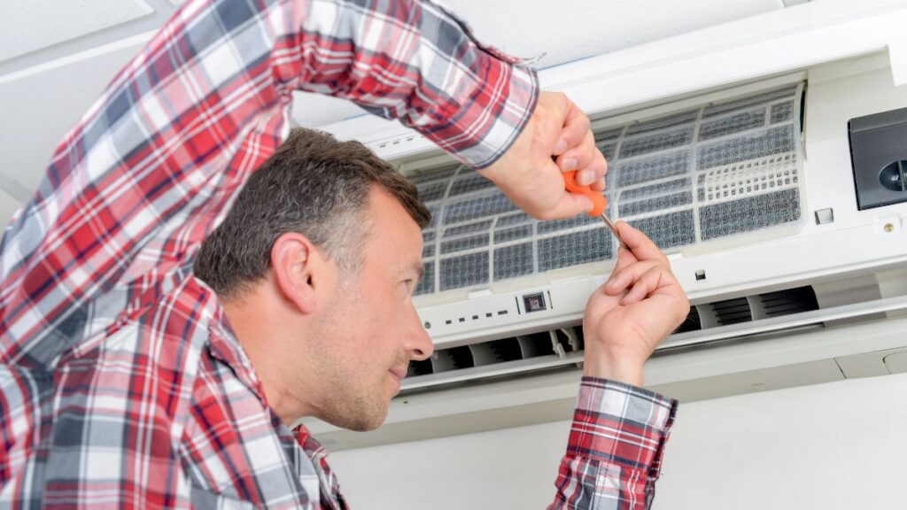 man working on HVAC