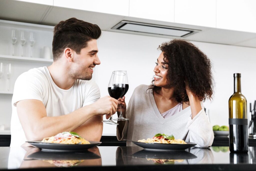 romantic date night at home, couple eating