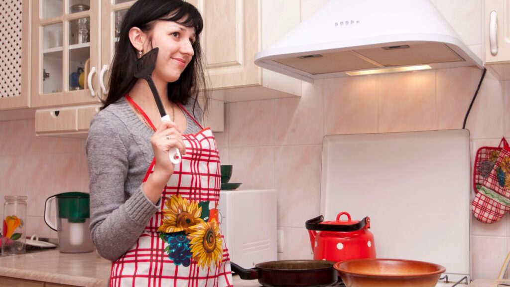 woman cooking at stove