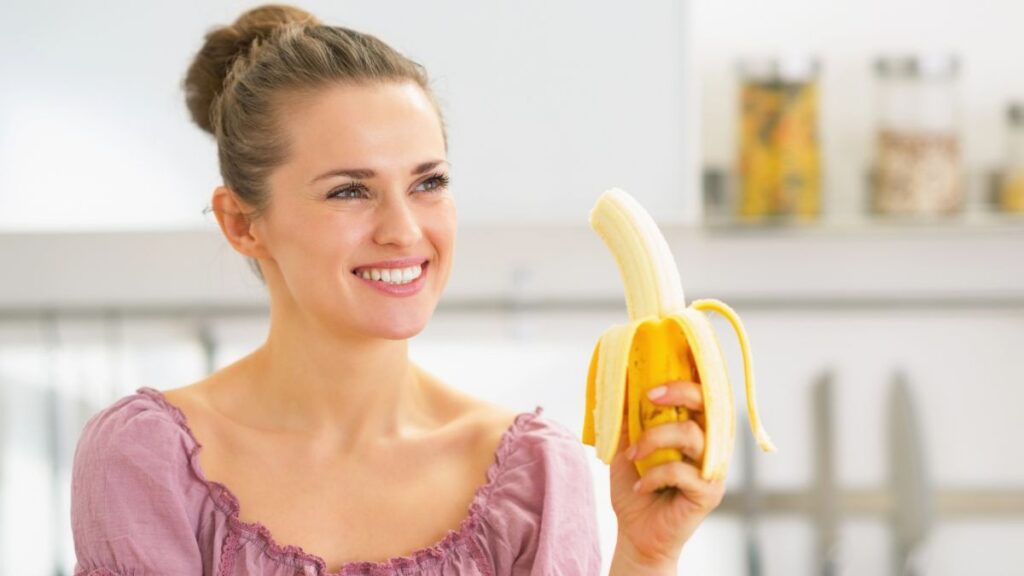 woman holding banana