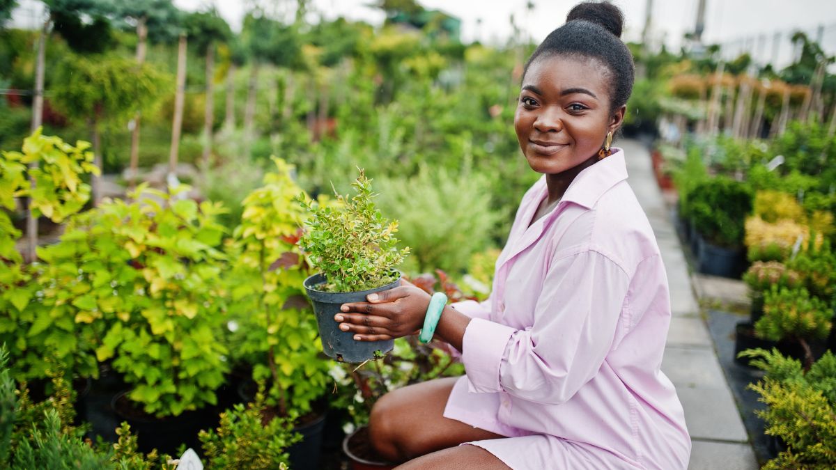 woman kneeling in garden