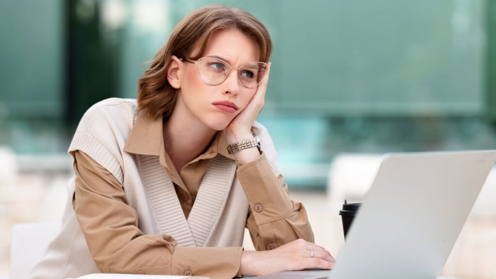 woman looking bored at work