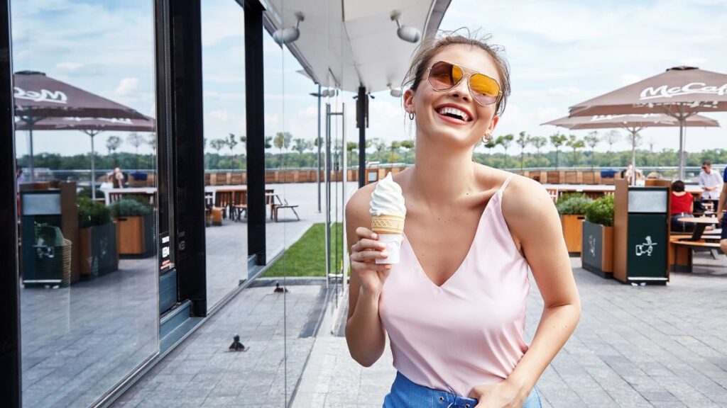 woman outside with ice cream cone