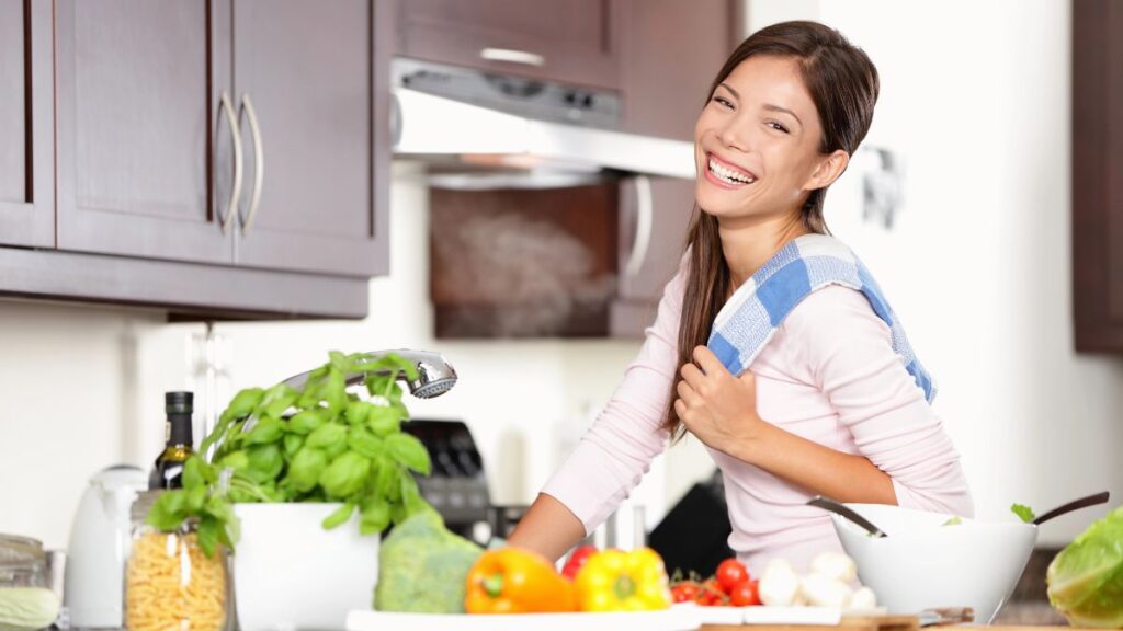 woman smiling in kitchen