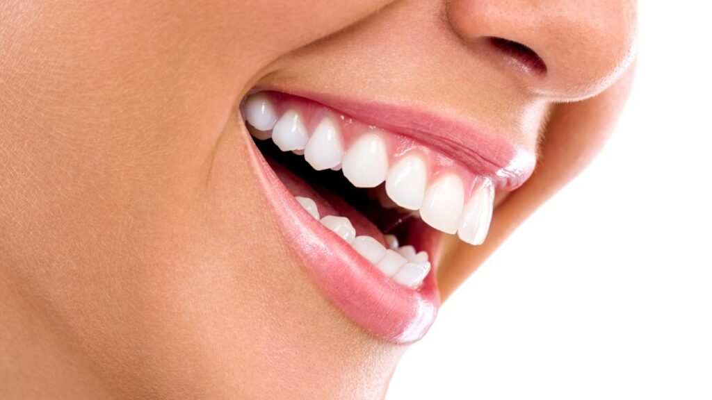 woman's mouth smiling with white teeth