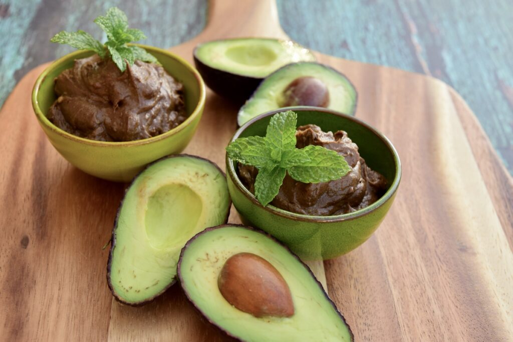 Vegan avocado chocolate mousse with mint leaves