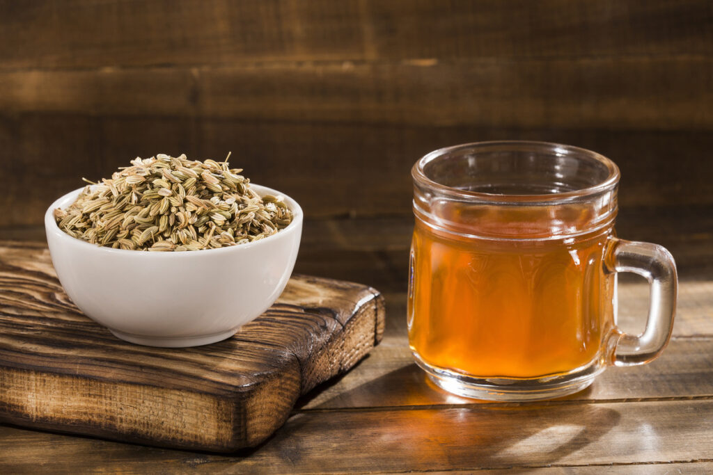 Herbal infusion fennel tea in glass cup and glass tea