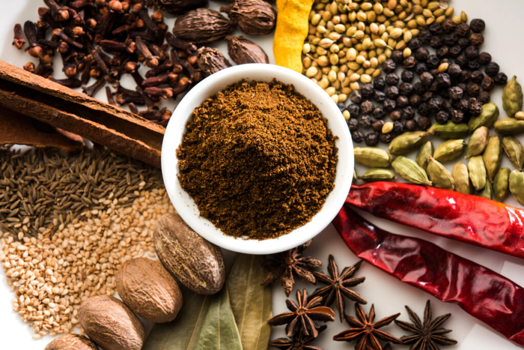 Indian Spice mix. Garam masala pile in white bowl