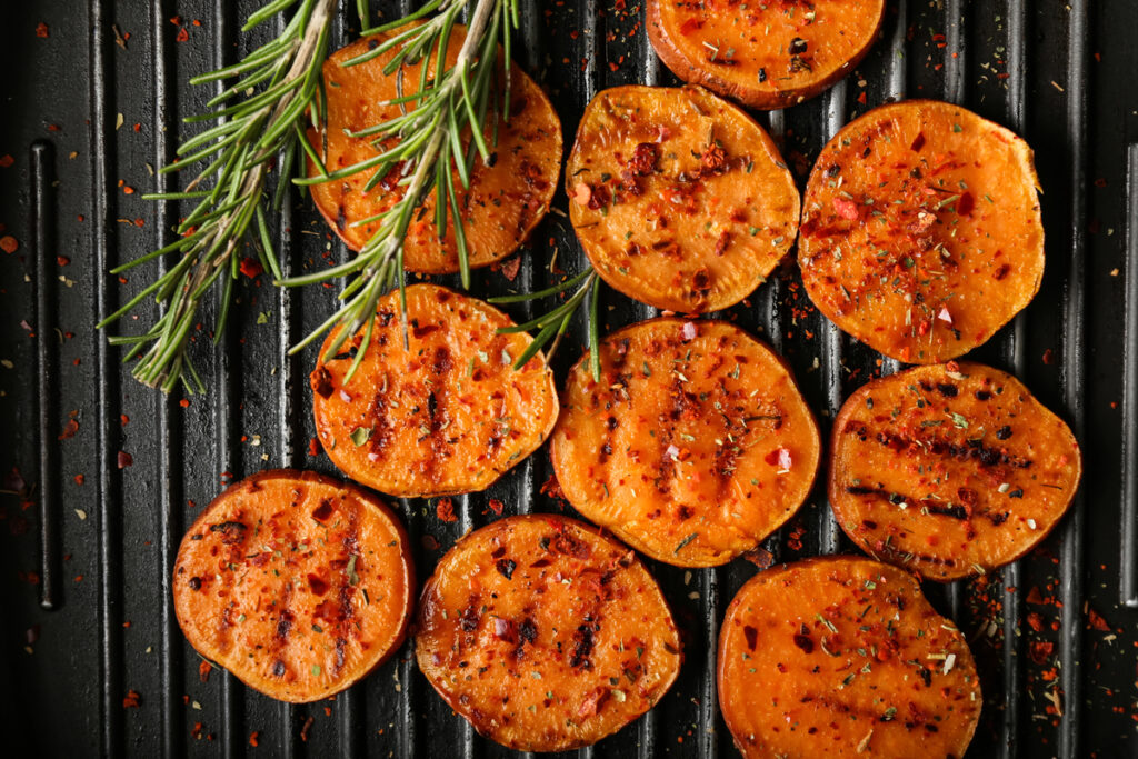 Tasty grilled sweet potato on pan