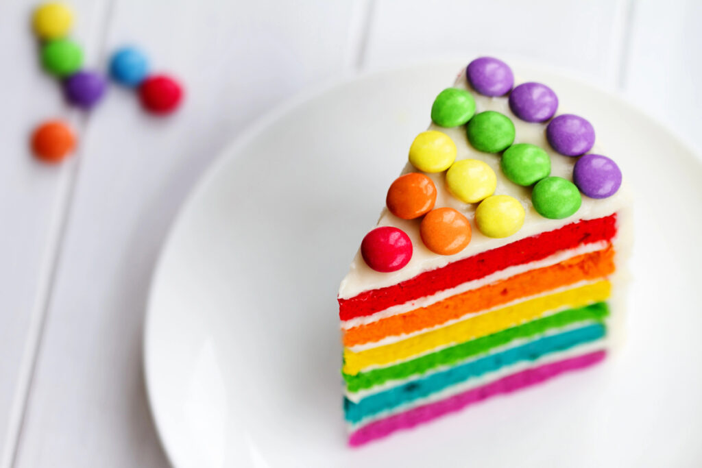 Slice of rainbow cake