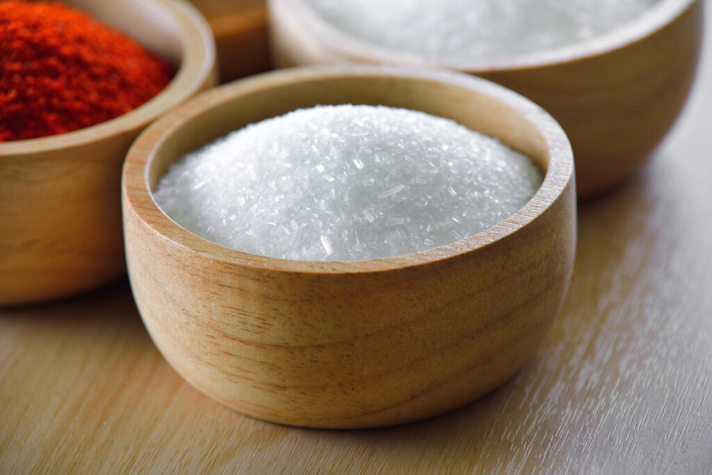 Monosodium Glutamate in wood bowl (MSG Salt)