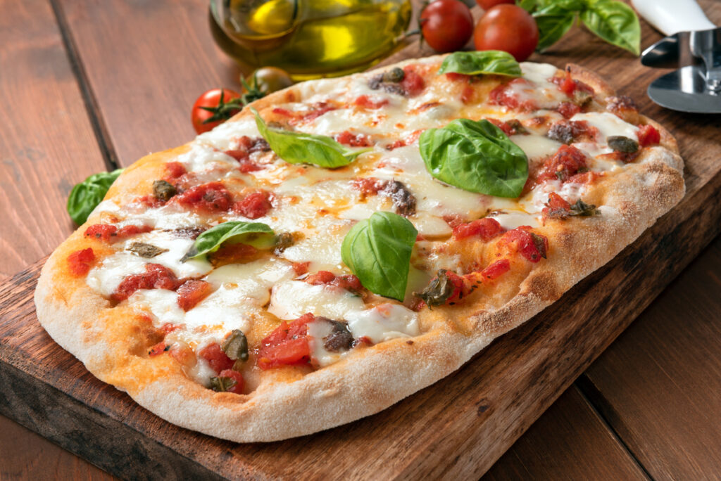 Delicious pinsa, a kind of traditional roman pizza, Italian Cuisine