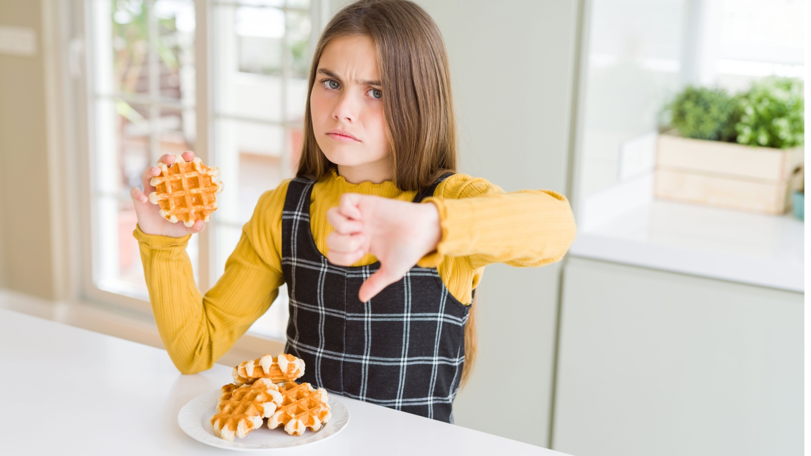 kid thumbs down reaction waffles