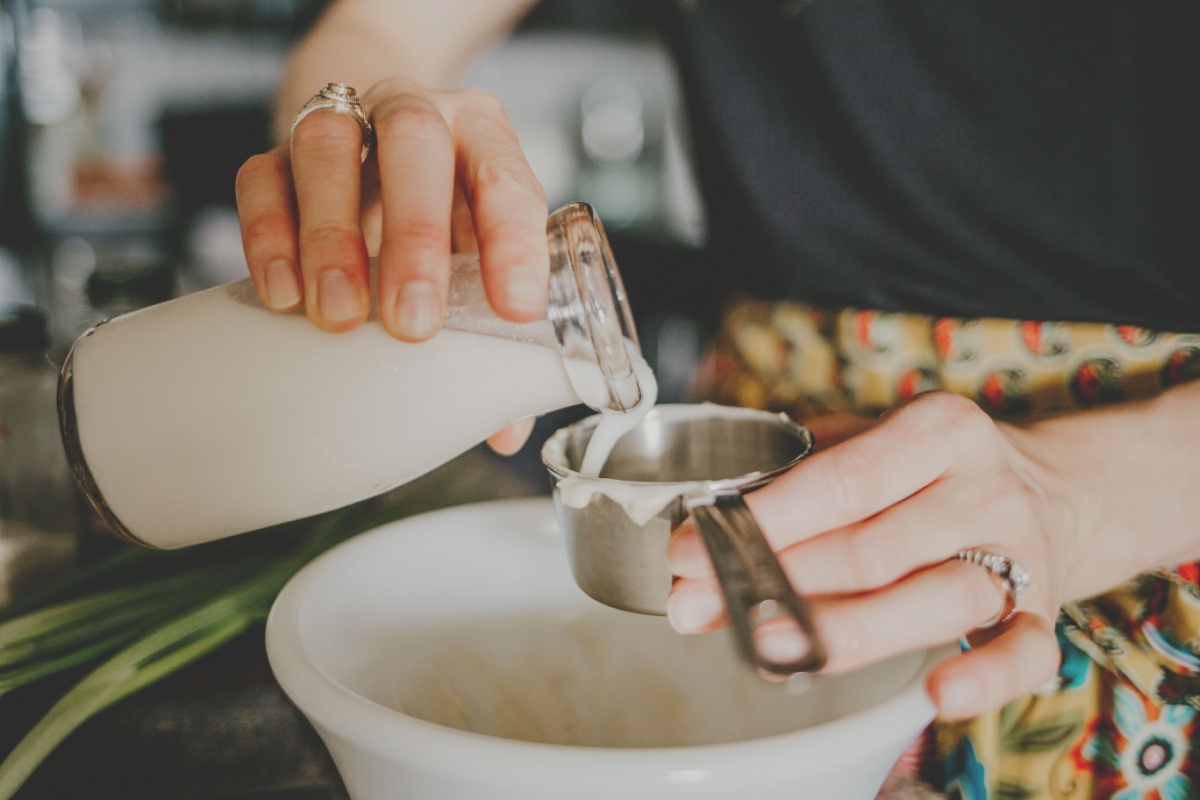 Women making homemade ranch dressing