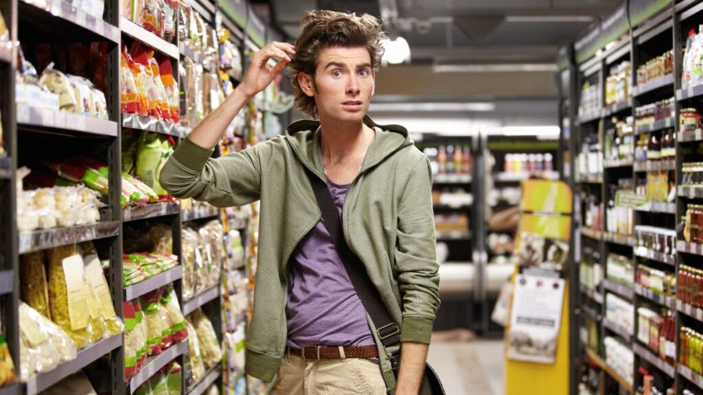 confused man in grocery store