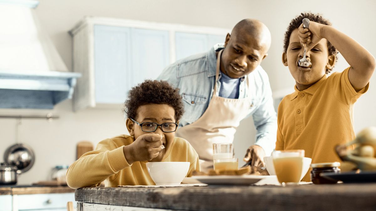 dad cooking with sons