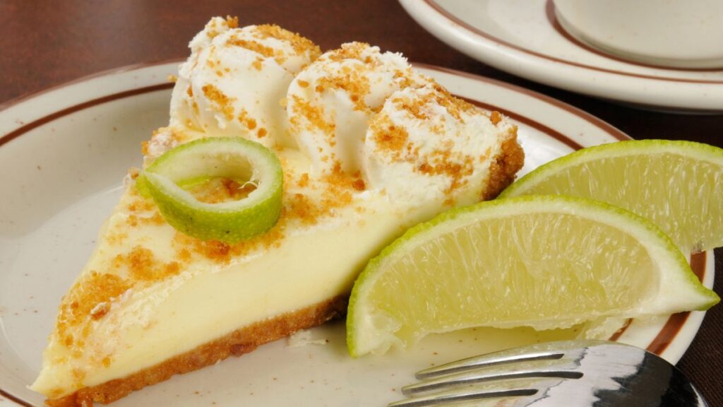 key lime pie and sliced limes