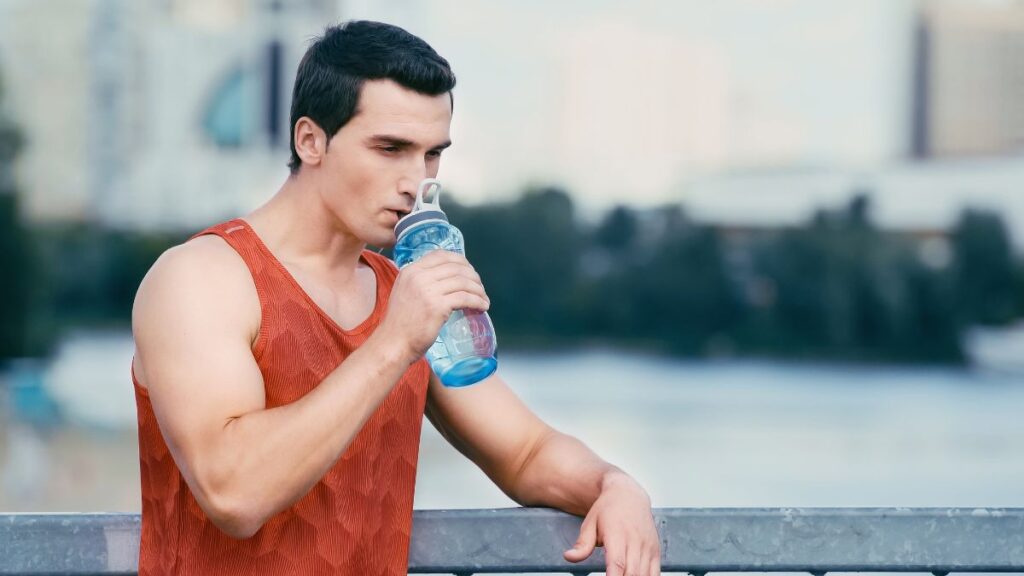 man drinking water