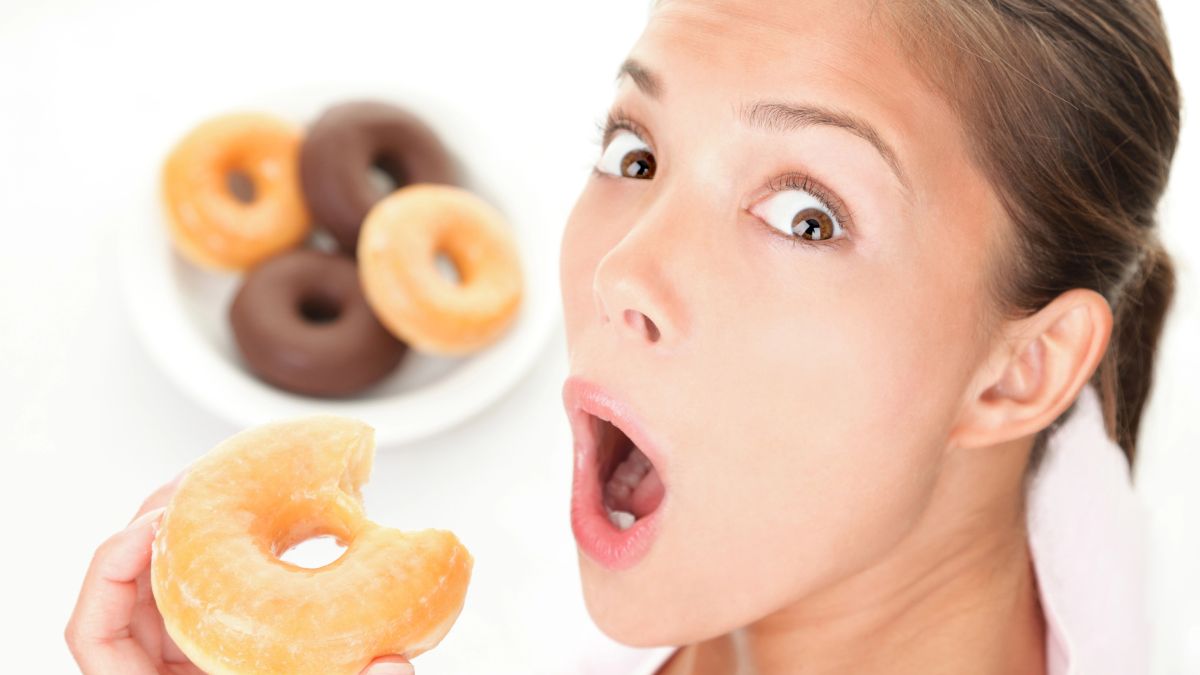 surprised woman with donut